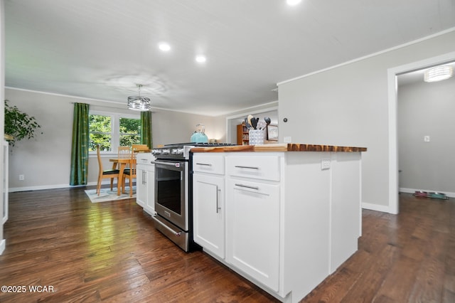 2715 Goldenrod Ln, Findlay, OH 45840 - kitchen featuring butcher block countertops, stainless steel range oven, white cabinetry, recessed lighting, and a kitchen island