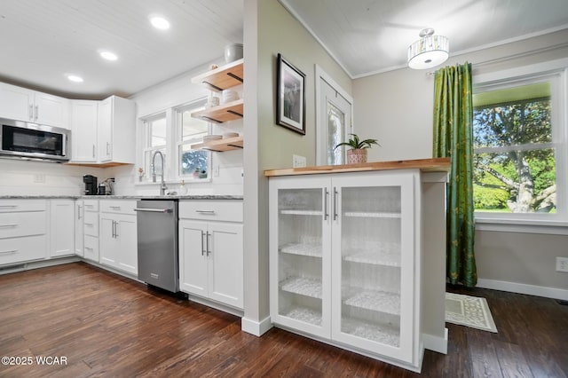 2715 Goldenrod Ln, Findlay, OH 45840 - kitchen with stainless steel appliances, crown molding, light stone countertops, white cabinets, and recessed lighting