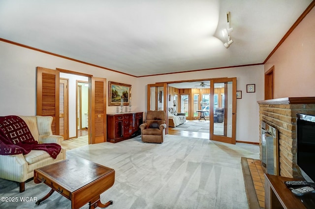 living room with french doors, light colored carpet, ornamental molding, and a brick fireplace