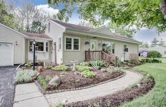 single story home with an attached garage