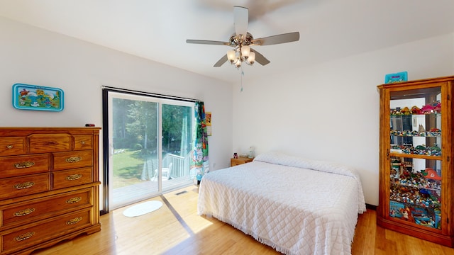 bedroom with access to outside, light wood-style flooring, and ceiling fan