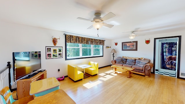 living room with visible vents and light wood finished floors