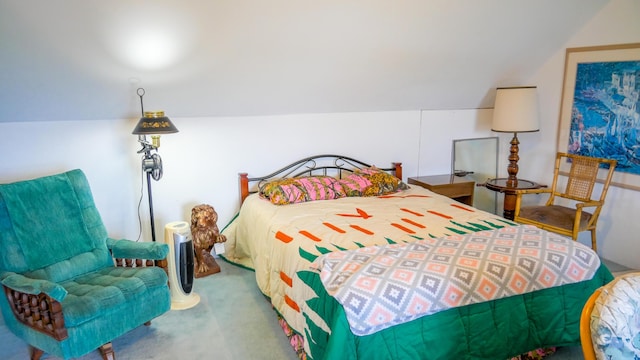 carpeted bedroom featuring vaulted ceiling