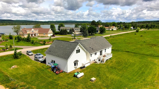 bird's eye view featuring a residential view and a water view