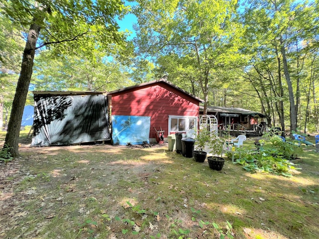 view of outbuilding with an outbuilding