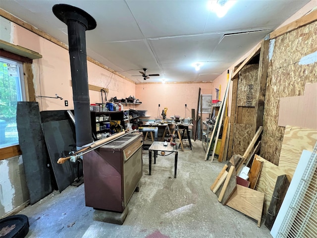 basement featuring a ceiling fan