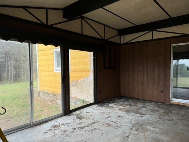 unfurnished sunroom featuring a healthy amount of sunlight