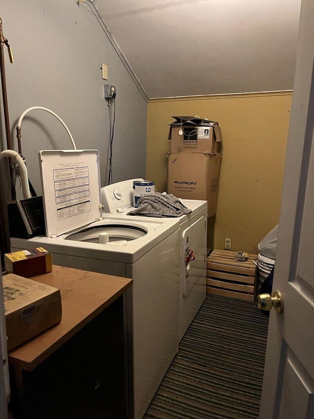 washroom with washer and dryer and laundry area