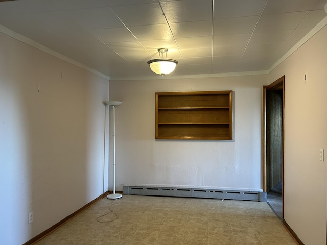 empty room featuring crown molding, a baseboard heating unit, and baseboards