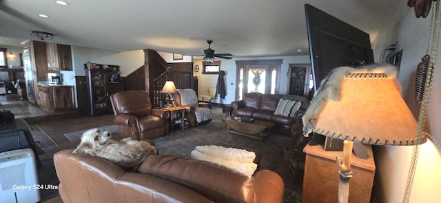 living room with recessed lighting, stairs, and ceiling fan