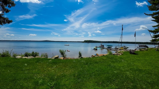 view of water feature with a dock