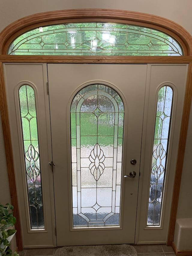 entryway featuring french doors