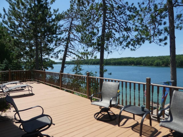 deck featuring a water view