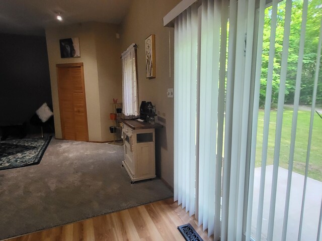 hall with visible vents and light wood-type flooring