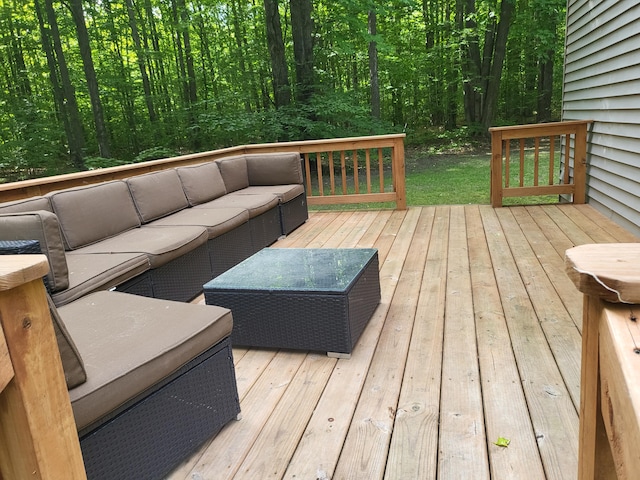 wooden deck with outdoor lounge area