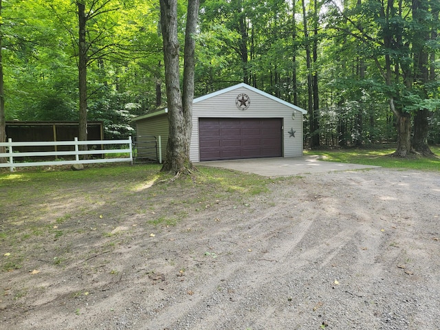 detached garage with fence