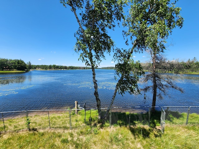 property view of water with fence