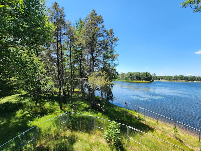 view of water feature featuring fence