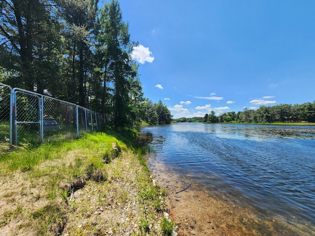 view of water feature featuring fence