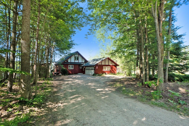 view of front of home with a garage and driveway