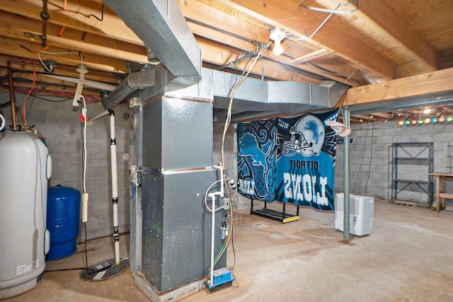 utility room featuring heating unit