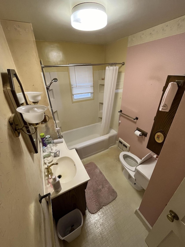 full bathroom featuring vanity, toilet, and shower / tub combo