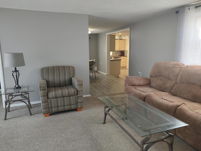 living room featuring baseboards