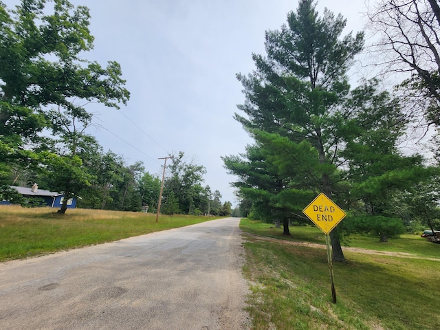 view of road with traffic signs