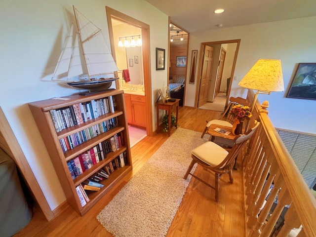 corridor featuring recessed lighting and light wood finished floors