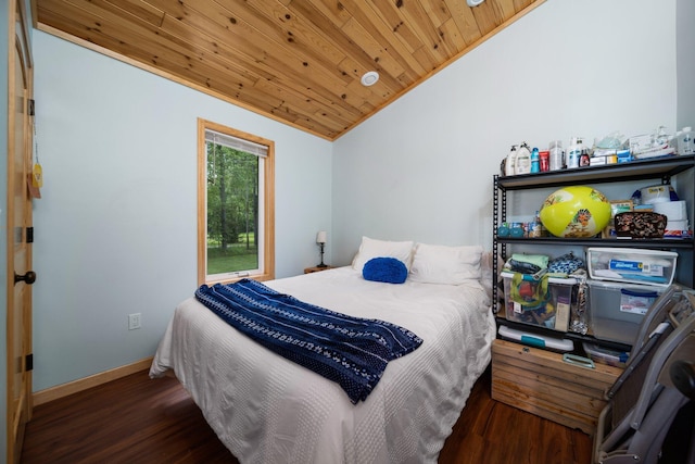 3551 W Otsego Lake Dr, Gaylord, MI 49735 - bedroom with baseboards, wood finished floors, wooden ceiling, and vaulted ceiling