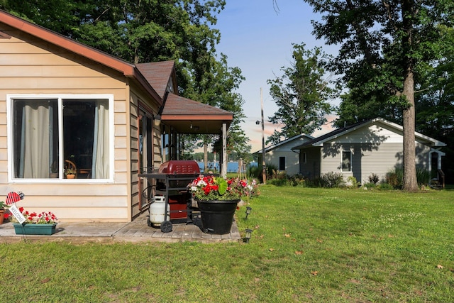 3551 W Otsego Lake Dr, Gaylord, MI 49735 - view of yard at dusk
