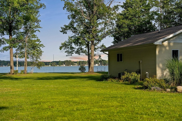 3551 W Otsego Lake Dr, Gaylord, MI 49735 - view of yard with a water view and central AC