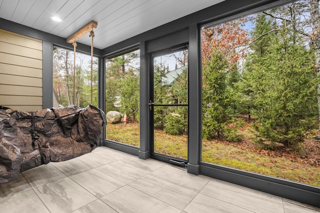 sunroom / solarium with wooden ceiling