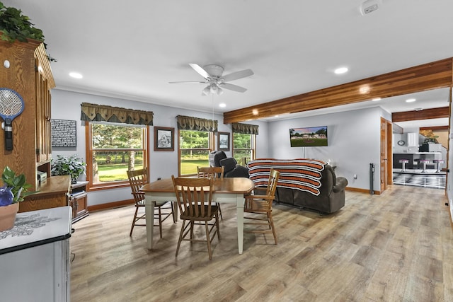 dining room featuring recessed lighting, light wood-style flooring, and baseboards