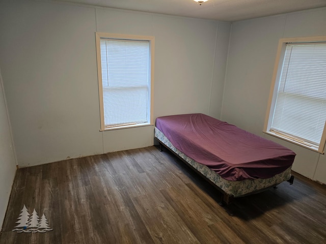 bedroom with wood finished floors