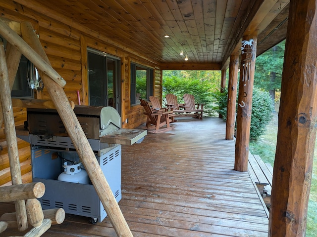 wooden terrace with covered porch