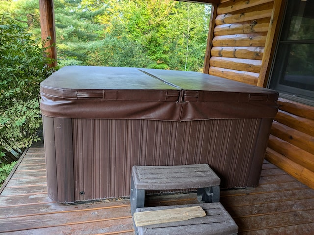 deck with a hot tub