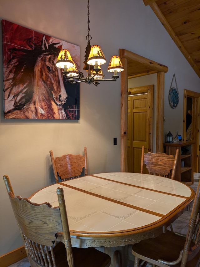 dining space with vaulted ceiling