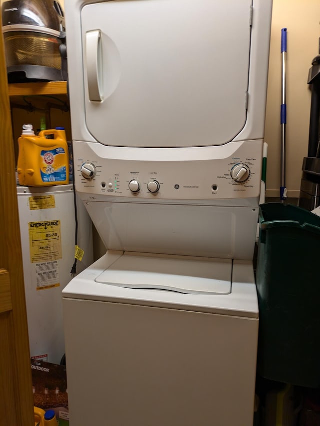 laundry area with laundry area and stacked washer and dryer