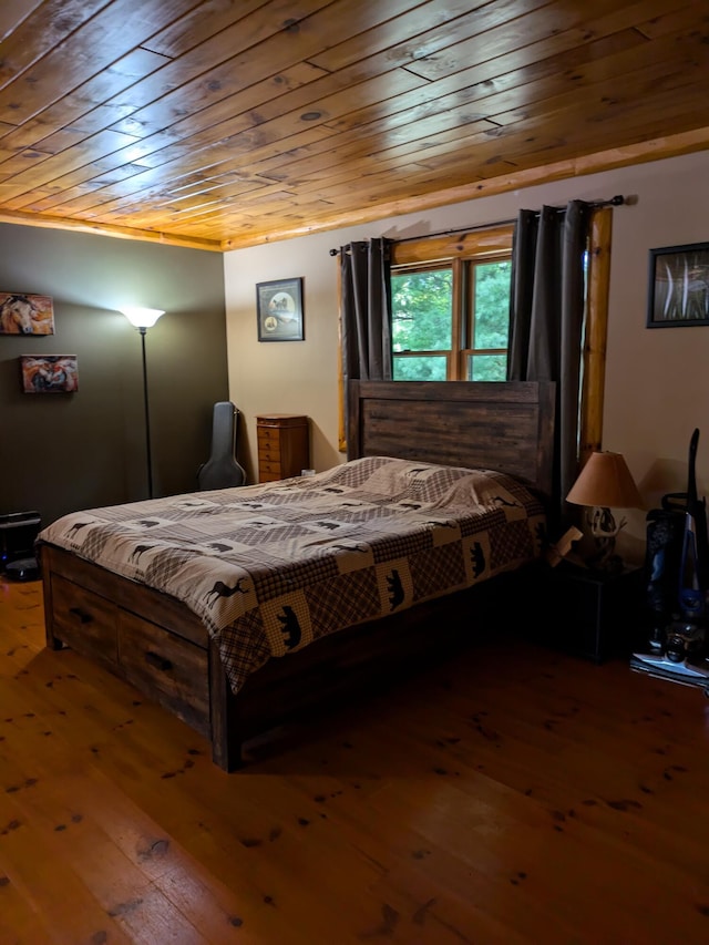 bedroom featuring wooden ceiling and hardwood / wood-style flooring