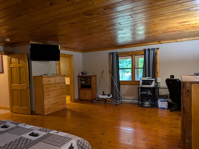 bedroom featuring baseboards, baseboard heating, light wood-style flooring, and wooden ceiling