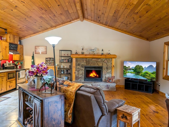 living room with a fireplace, lofted ceiling with beams, light wood-style flooring, and wood ceiling