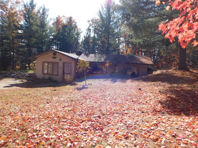 view of outbuilding with a carport