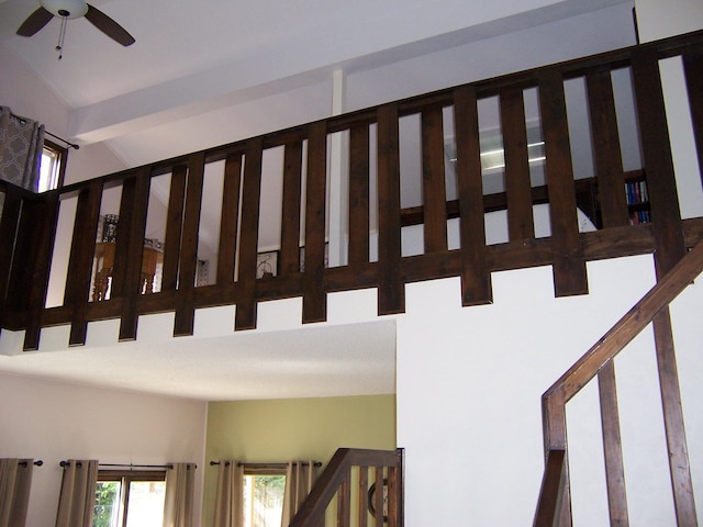 stairway with a ceiling fan