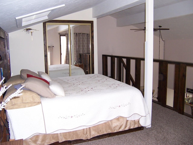 carpeted bedroom featuring vaulted ceiling