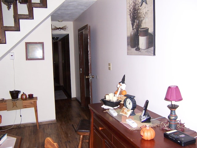 hall featuring dark wood-style flooring