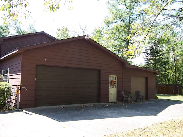 garage with fence