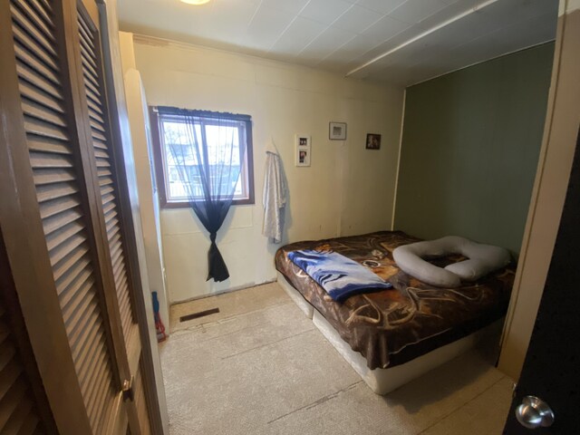 bedroom featuring visible vents