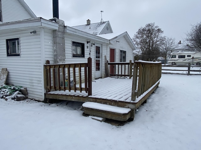 view of snow covered deck