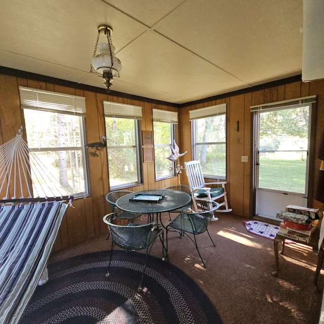 sunroom featuring a healthy amount of sunlight